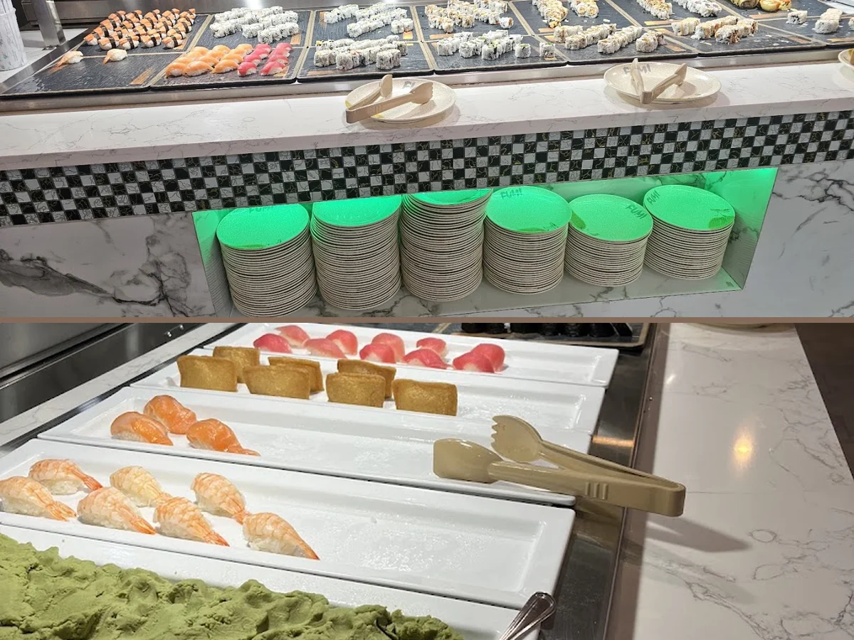 Buffet trays with sushi and grilled dishes