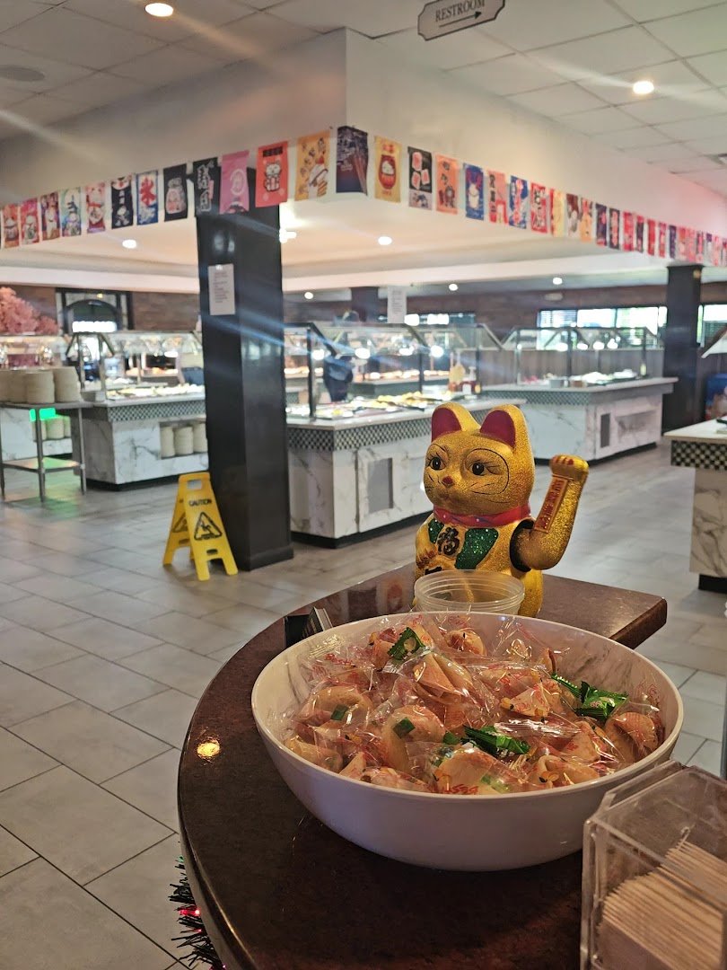 Asian restaurant dining area with buffet stations