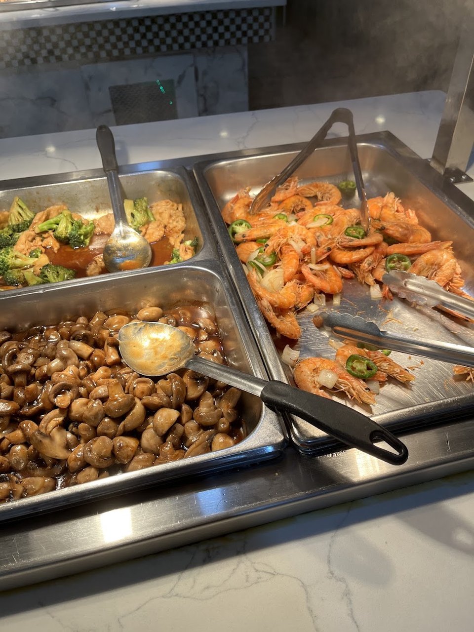 Sushi rolls and hot buffet selections