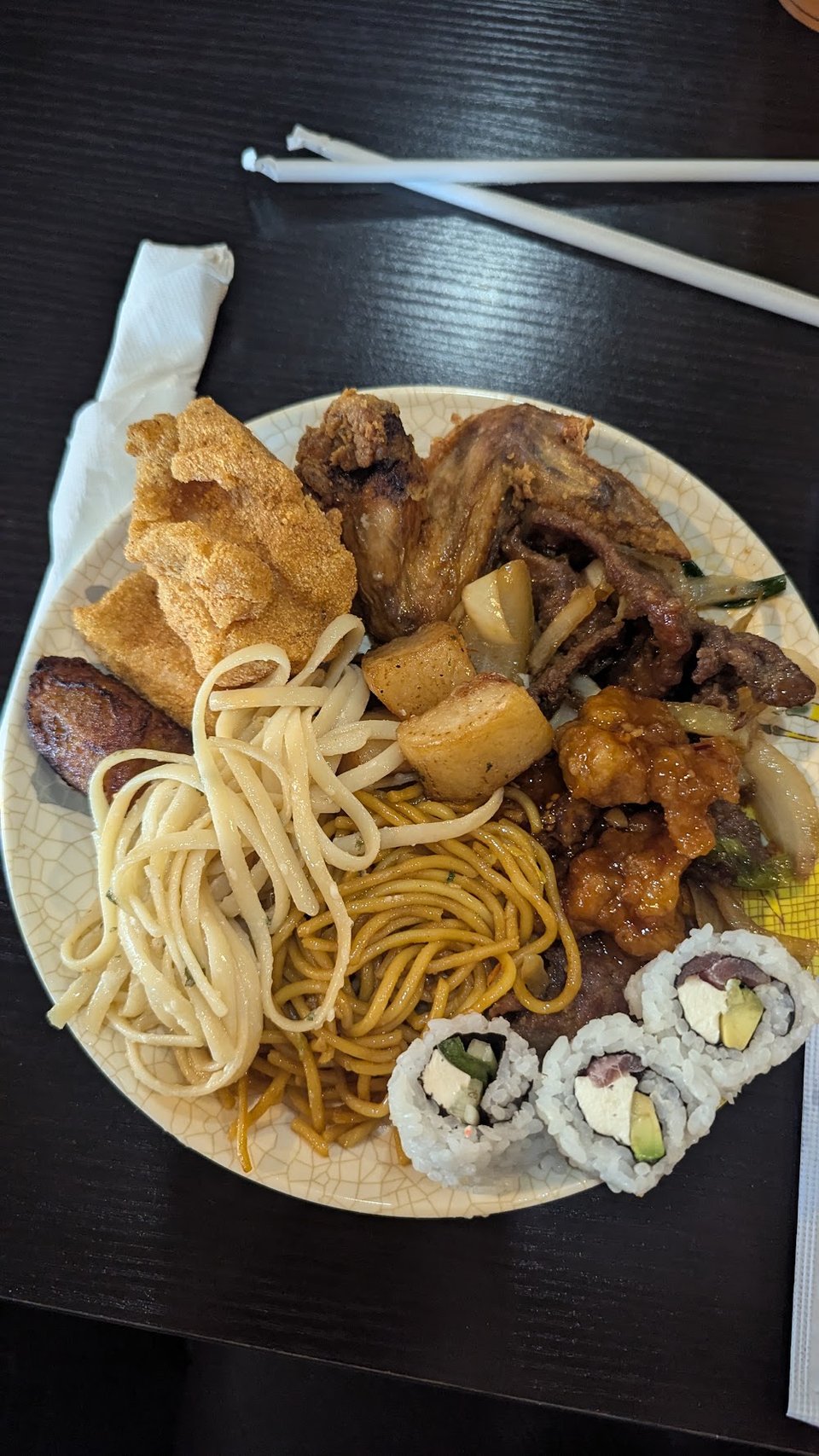 Mixed Asian dishes ready for self-service